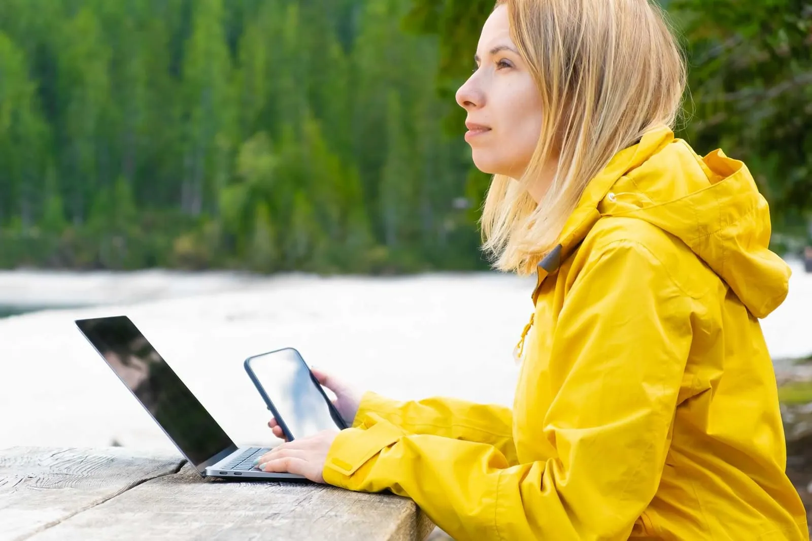 Woman outdoors thinking about her rental property