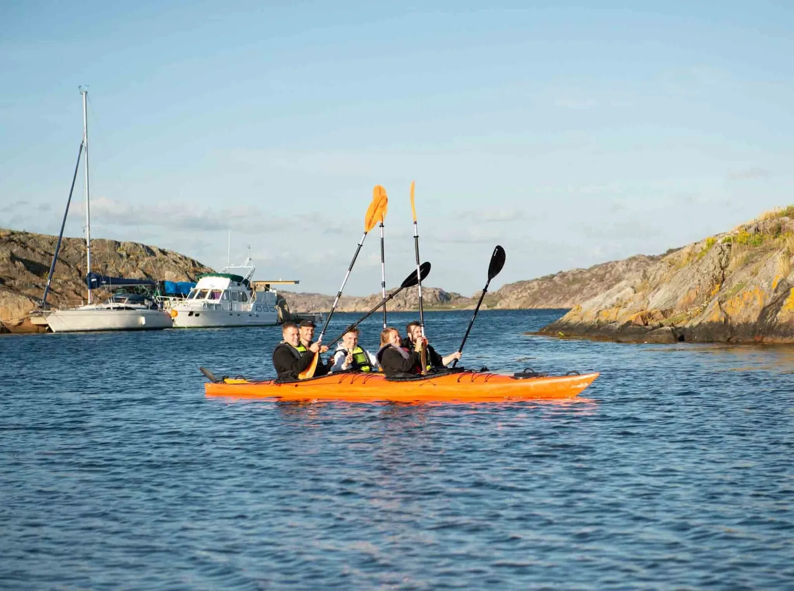 Kayak paddler outside Björholmen, West Coast