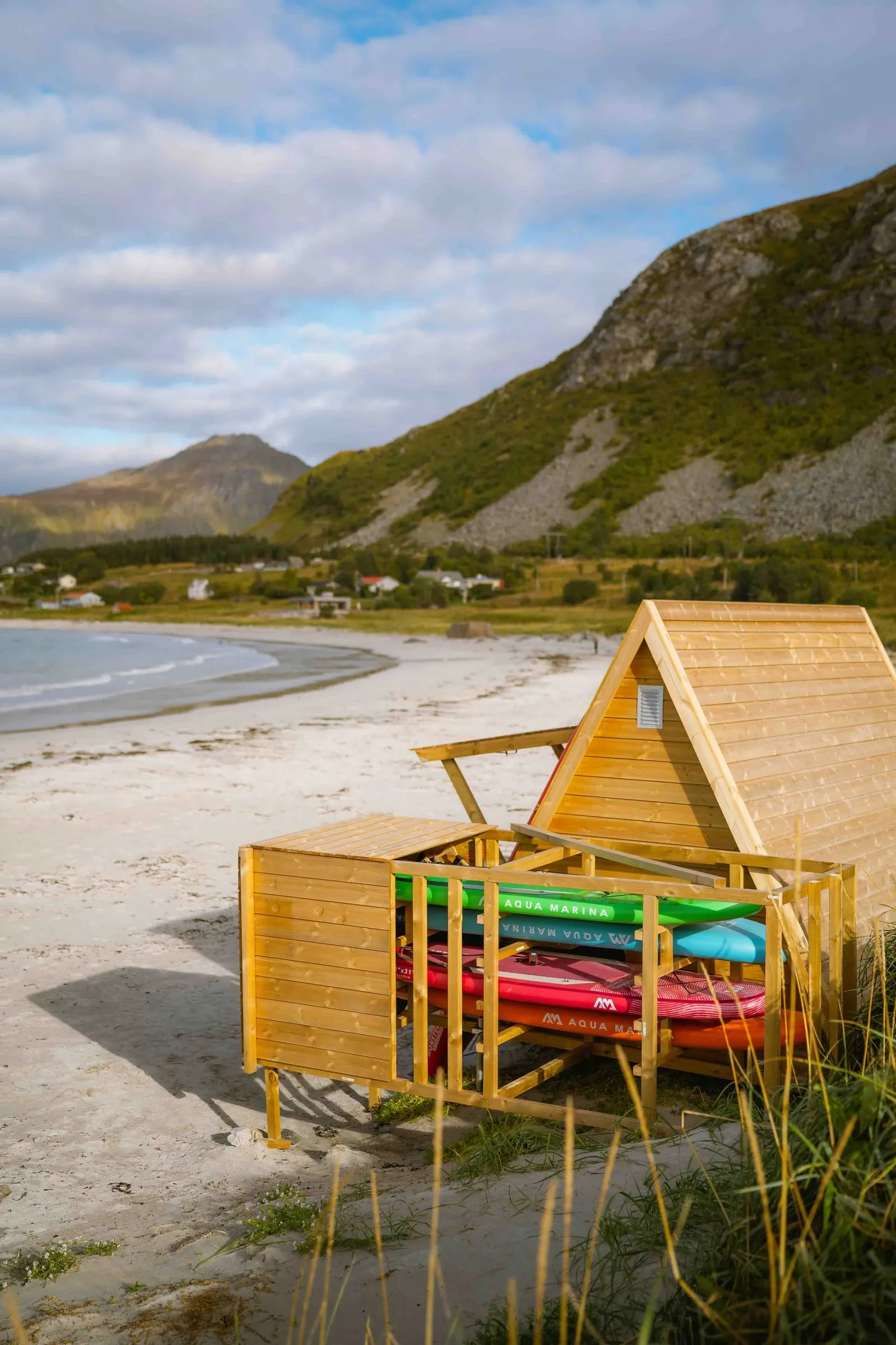 Self-service SUP rental cabinet by the water in Lofoten